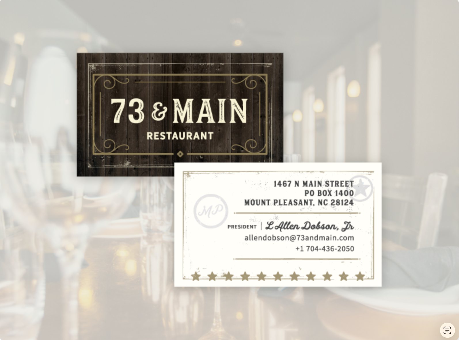 Business cards: dark wood-texture front with the framed logo, cream back with address and a row of stars